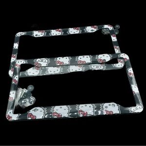 NWT HELLO KITTY LICENSE PLATE HOLDER 2 PIECES BLACK BACKGROUND BLACK WHITE RED